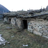 Abandoned house. Archaeologization process of debris accumulation.