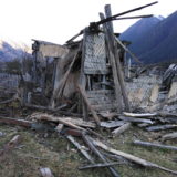 Abandoned house. Archaeologization process of debris accumulation. Remark the fact of mud daub - it lasted longer preserved than wooden parts.